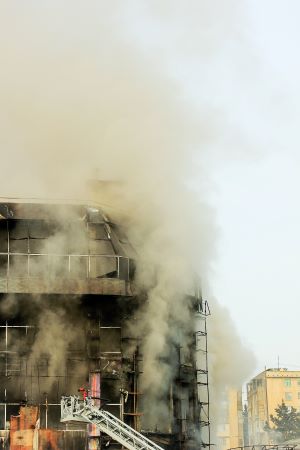 burning shopping center mall with smoke 1 003